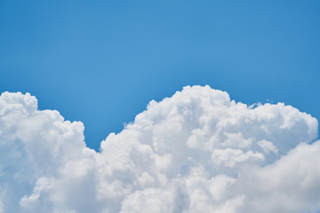 large white clouds in blue sky