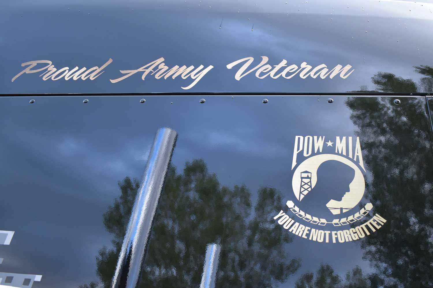 custom painted semi truck with a pow mia theme