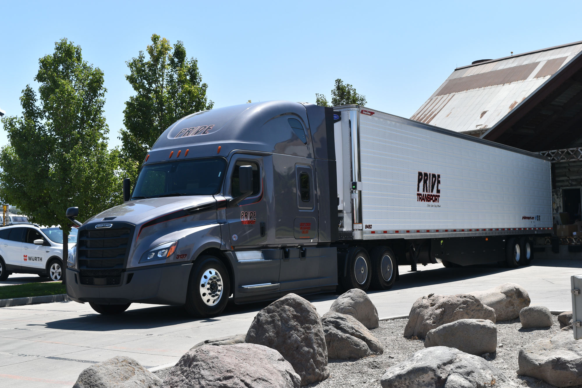 pride transport truck backed into harley davidson dock