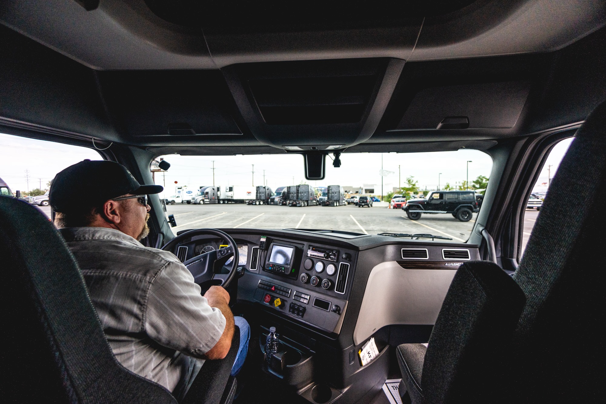 pride driver in truck cab