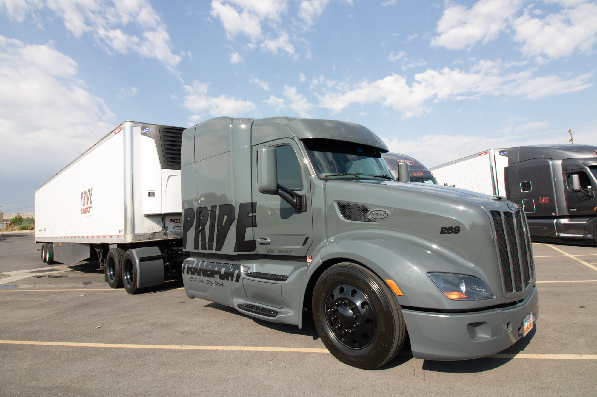 pride transport truck parked in lot