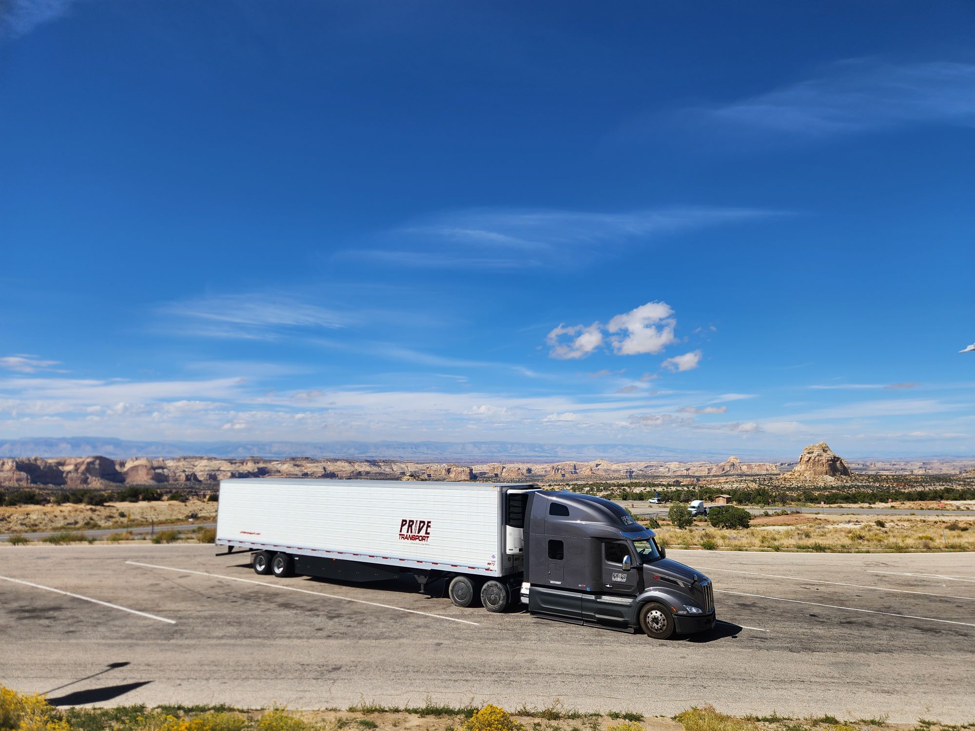 Pride Transport truck parked in lot