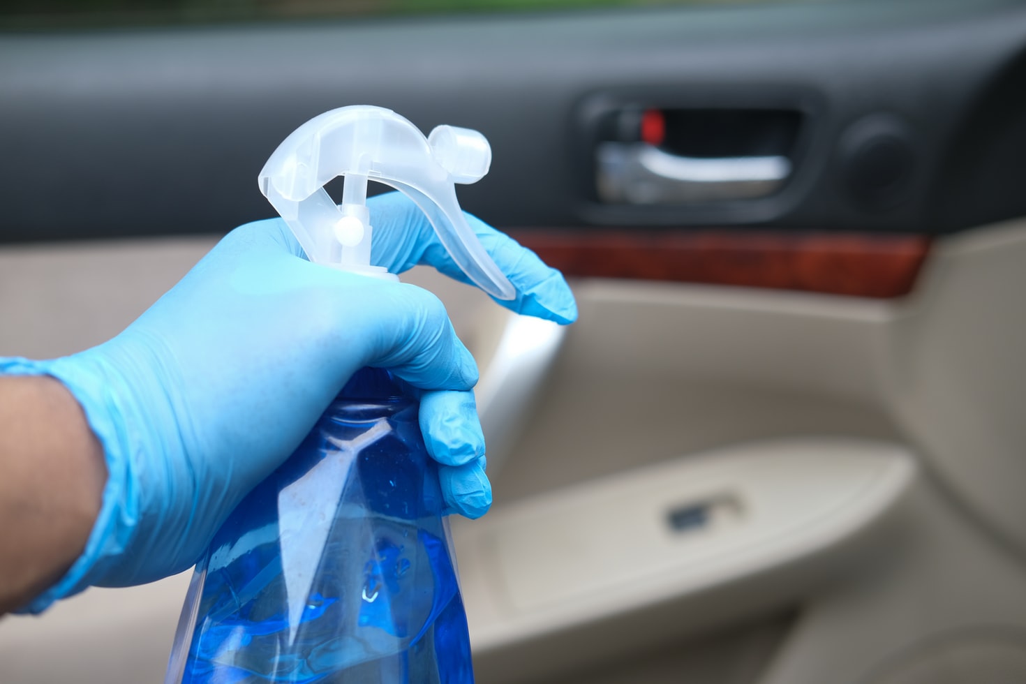 cleaning liquid being used on a car