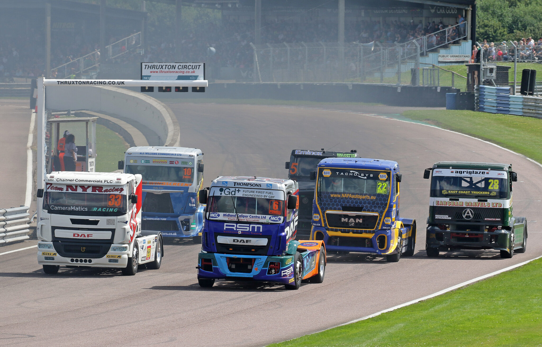 semi trucks racing convoy in the park