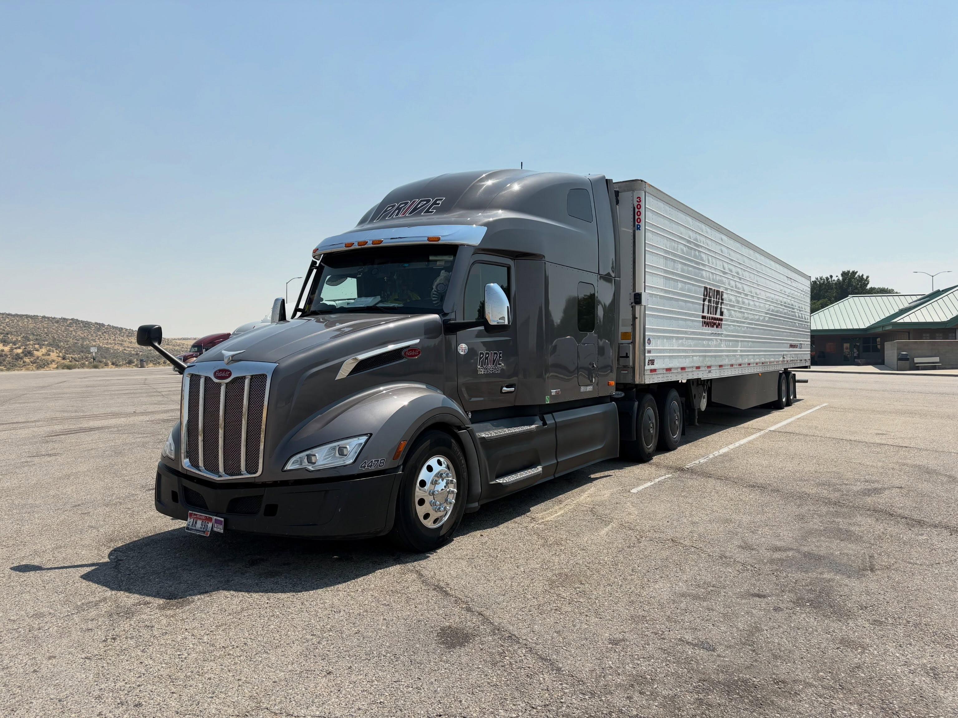 pride transport truck in truck stop lot
