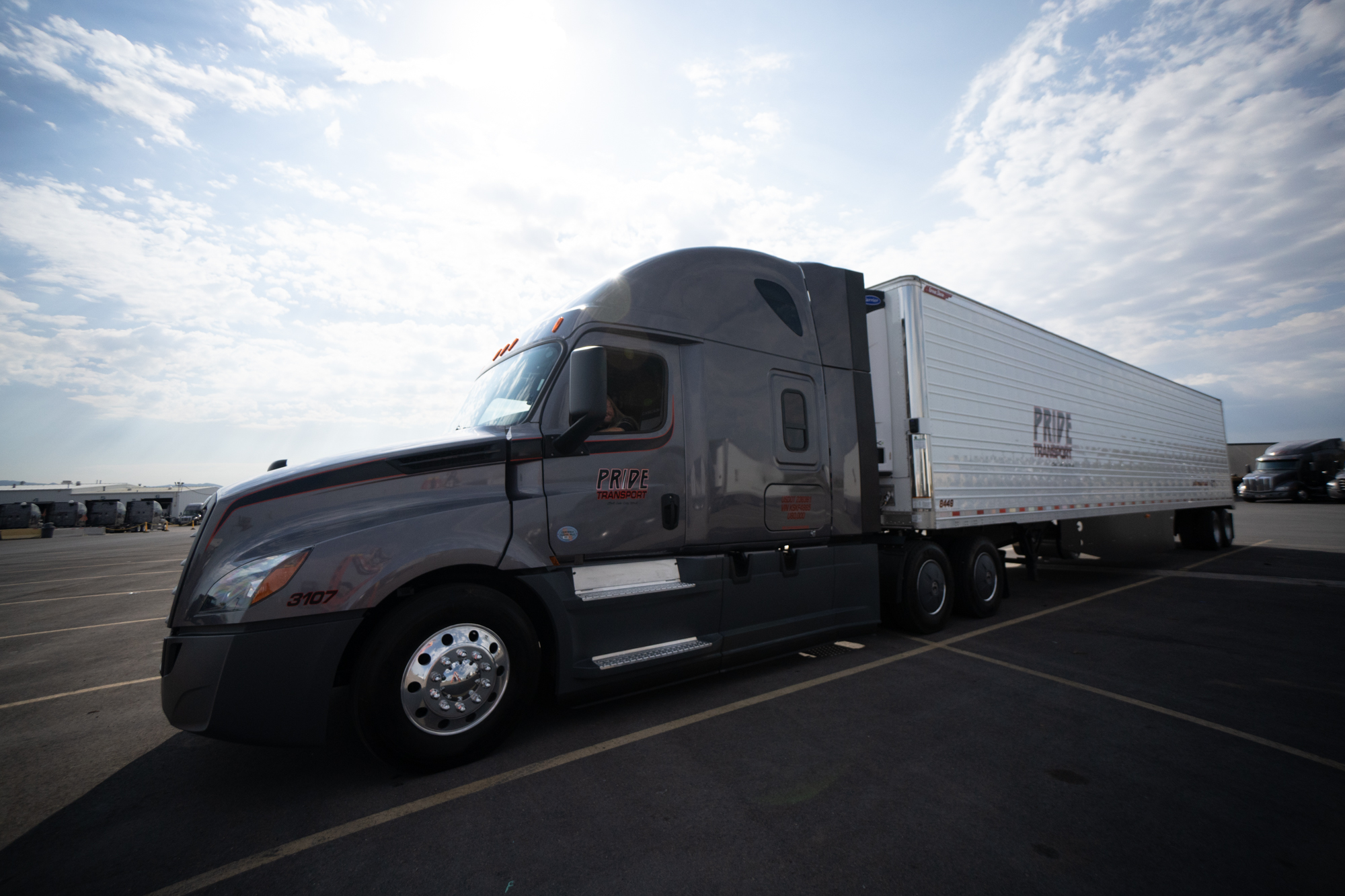 pride transport truck parked in lot