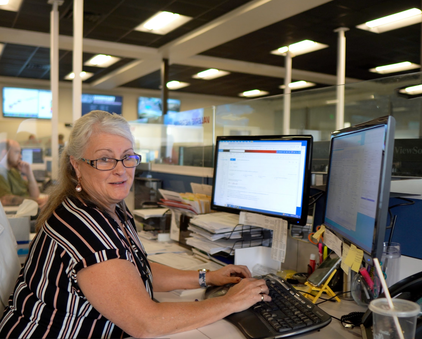 pride transport dispatcher at desk