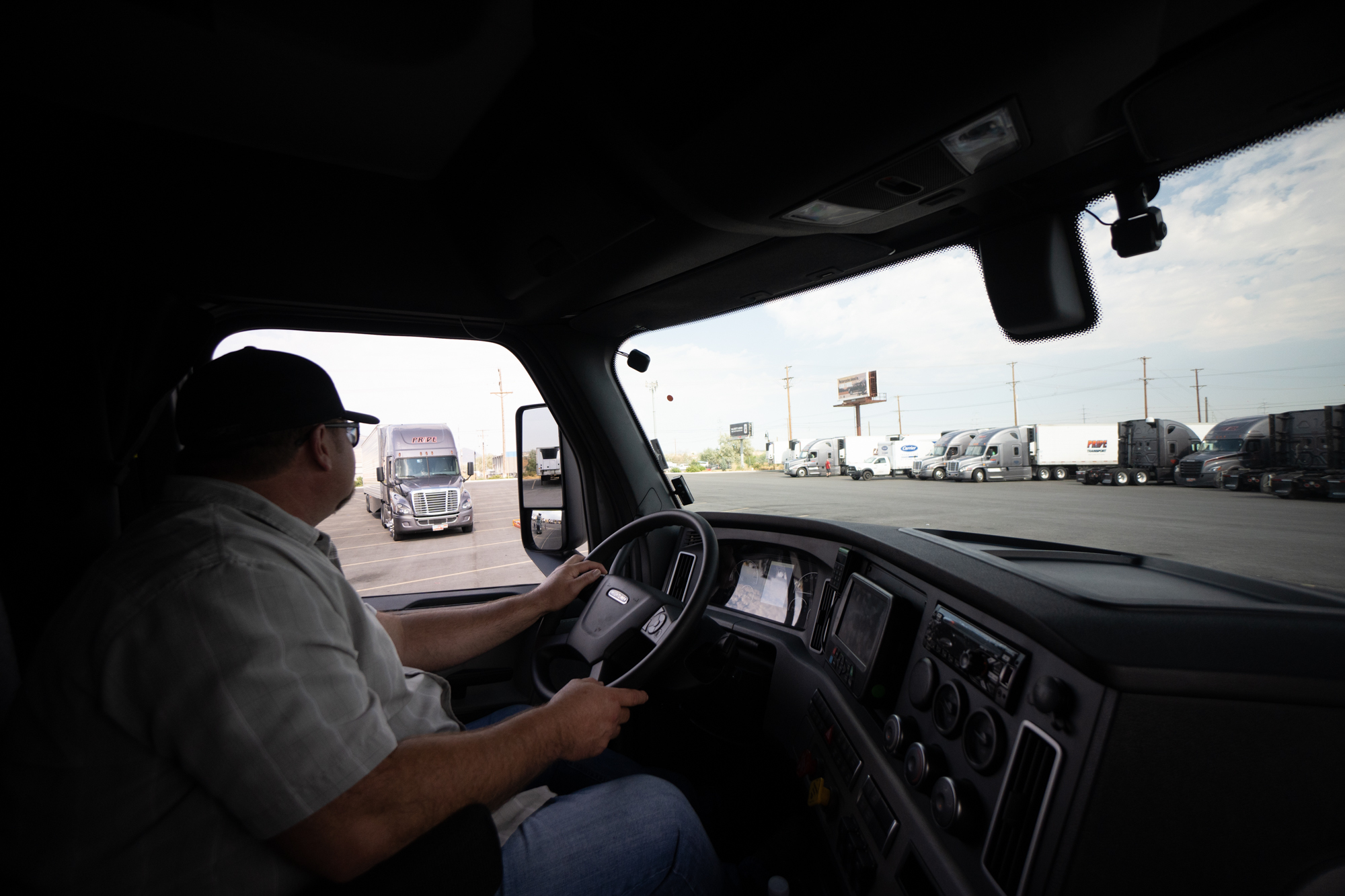 pride transport driver driving truck