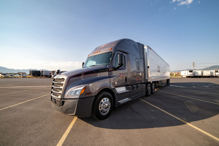 long haul truck parked in a parking lot