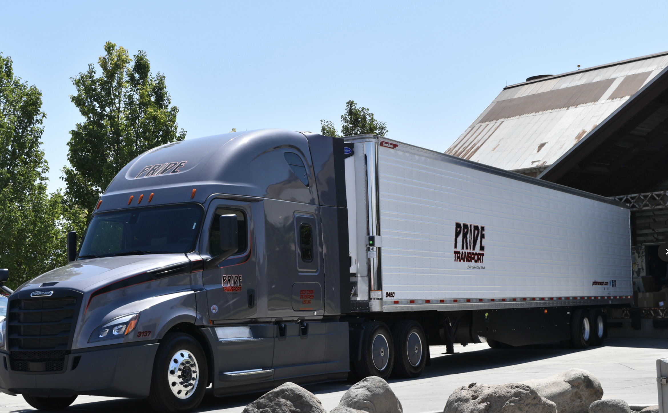 pride transport truck at loading dock