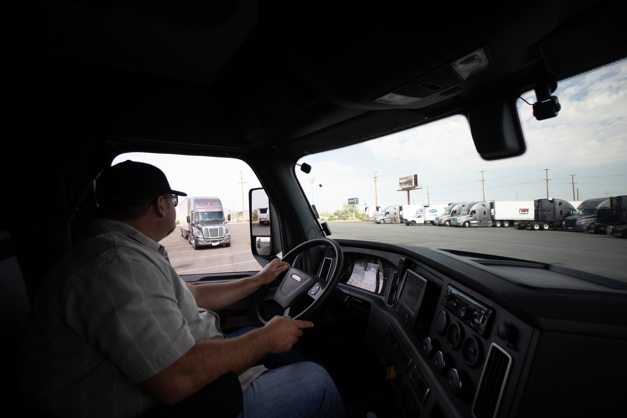 pride transport driver behind wheel