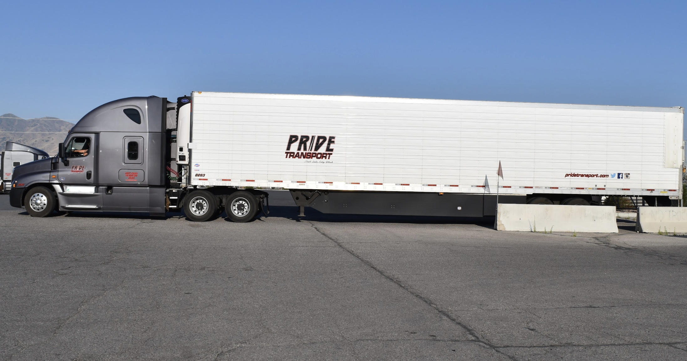 pride transport truck in parking lot