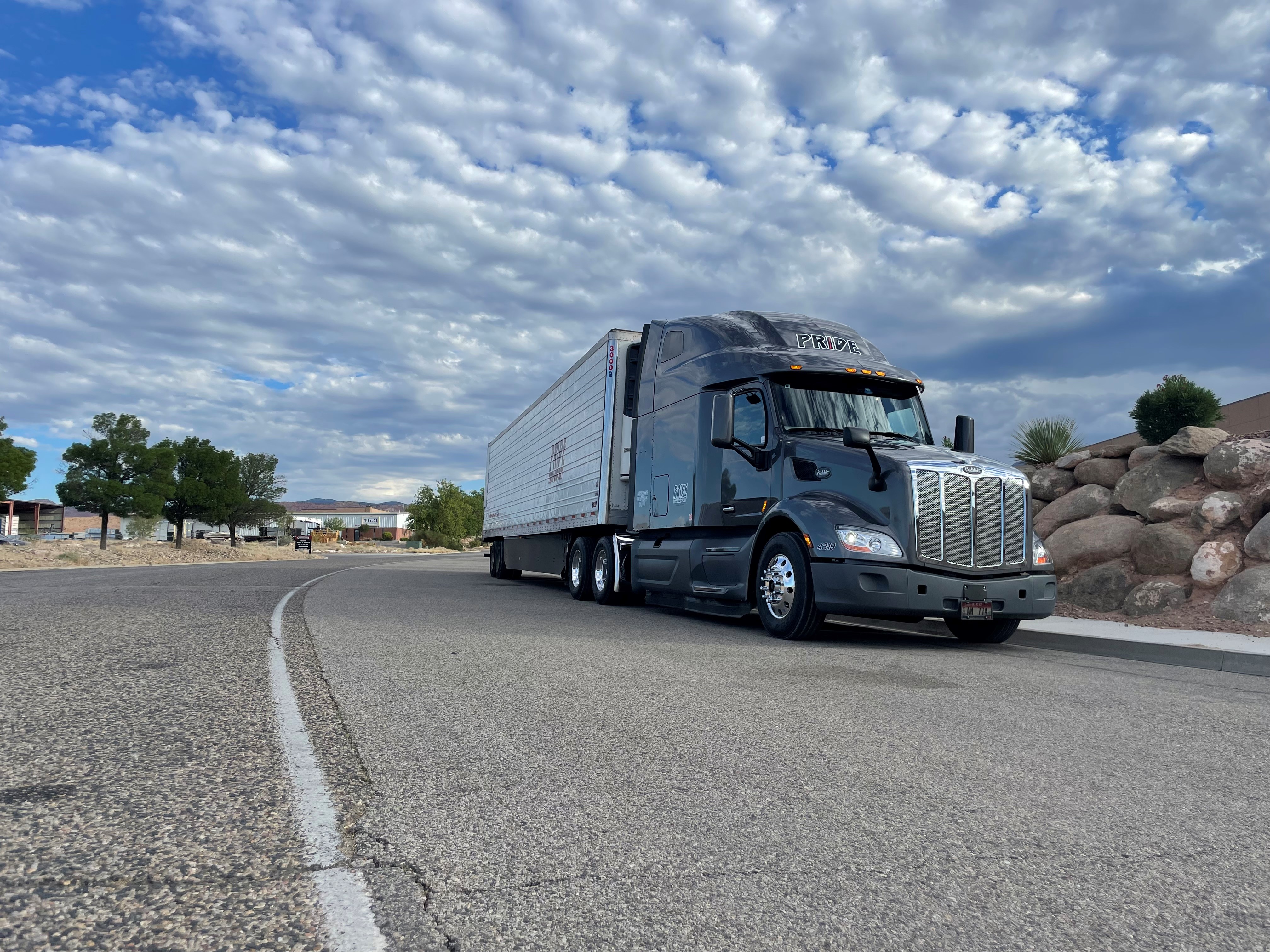 pride transport truck on the road