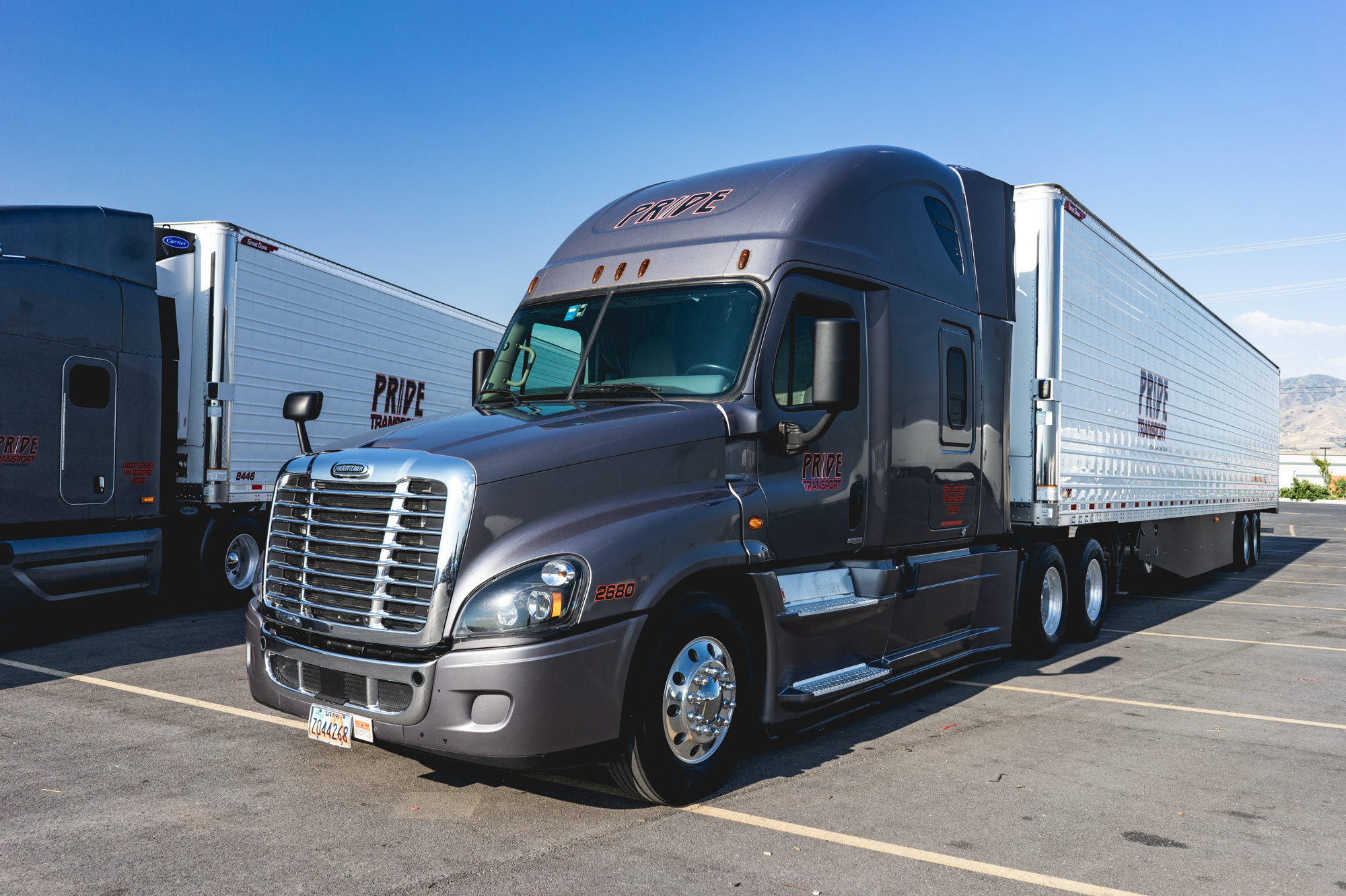 pride transport trucks parked