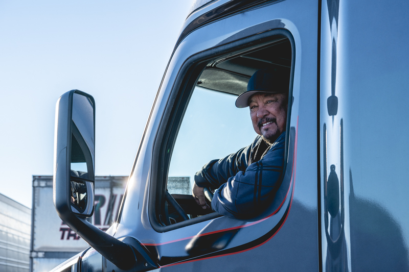 pride transport driver in truck