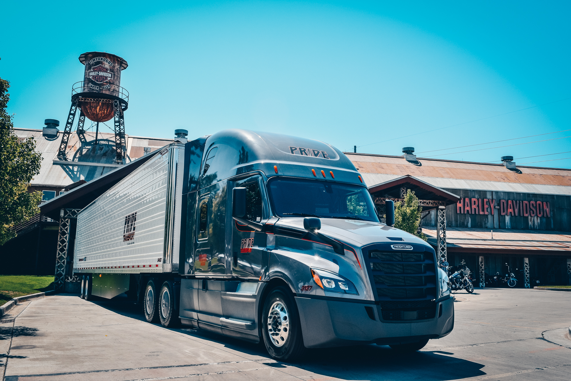 pride transport truck backed into harley davidson loading dock