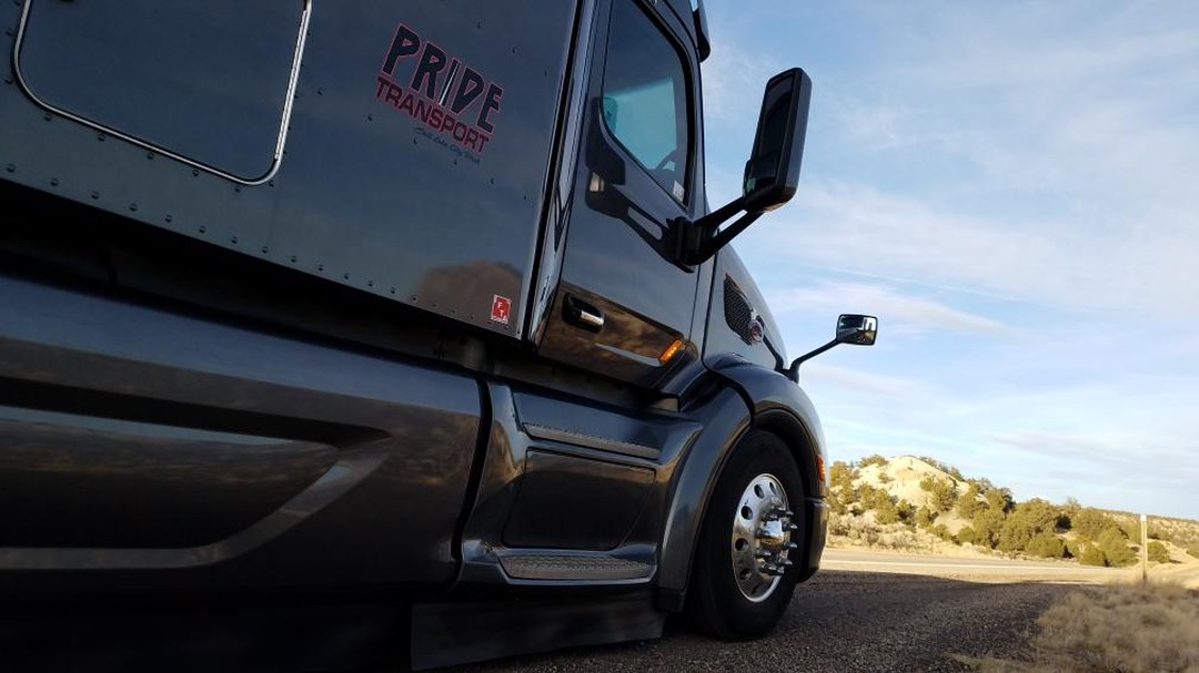 pride transport truck parked