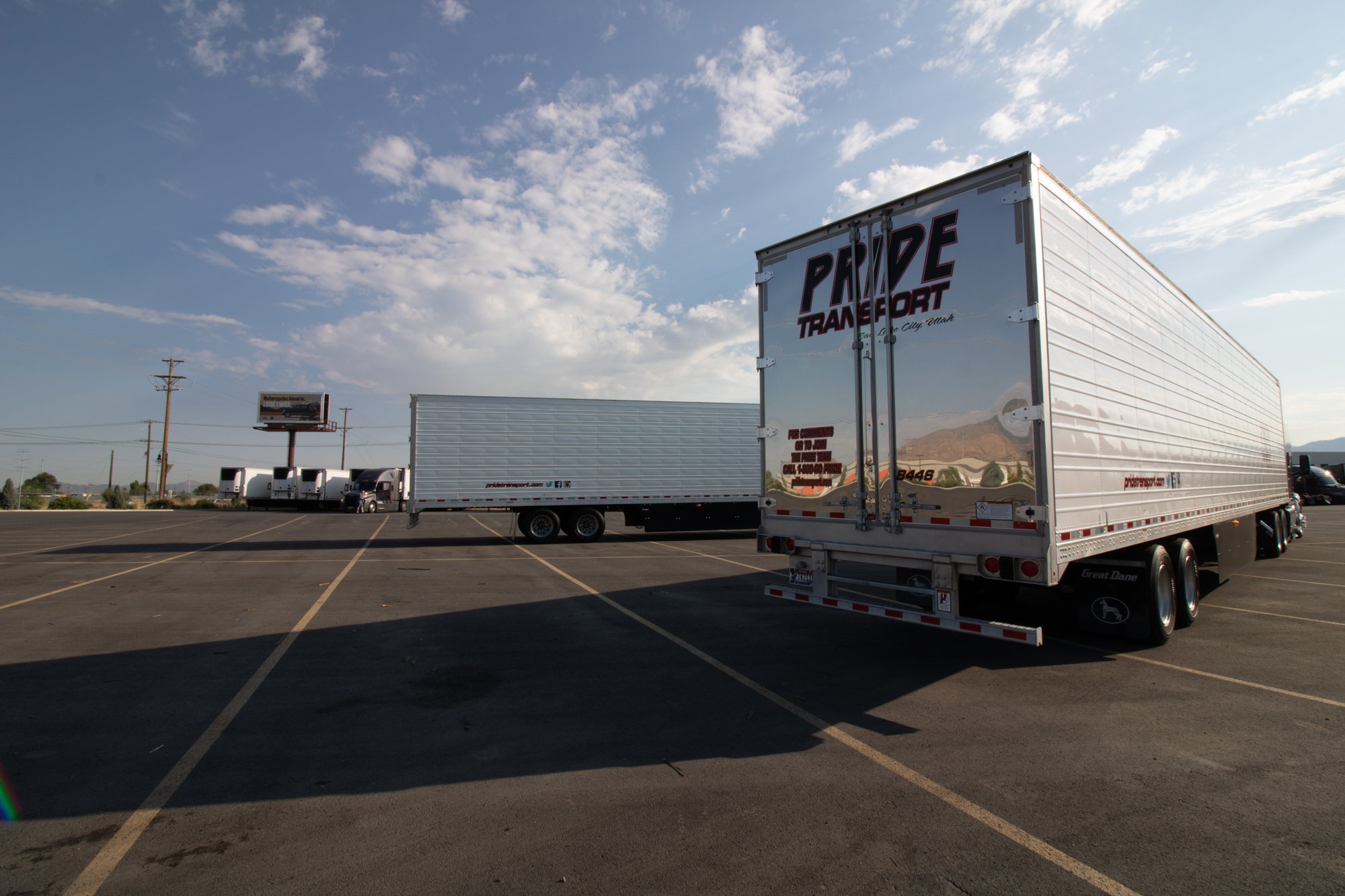 pride transport trucks from behind