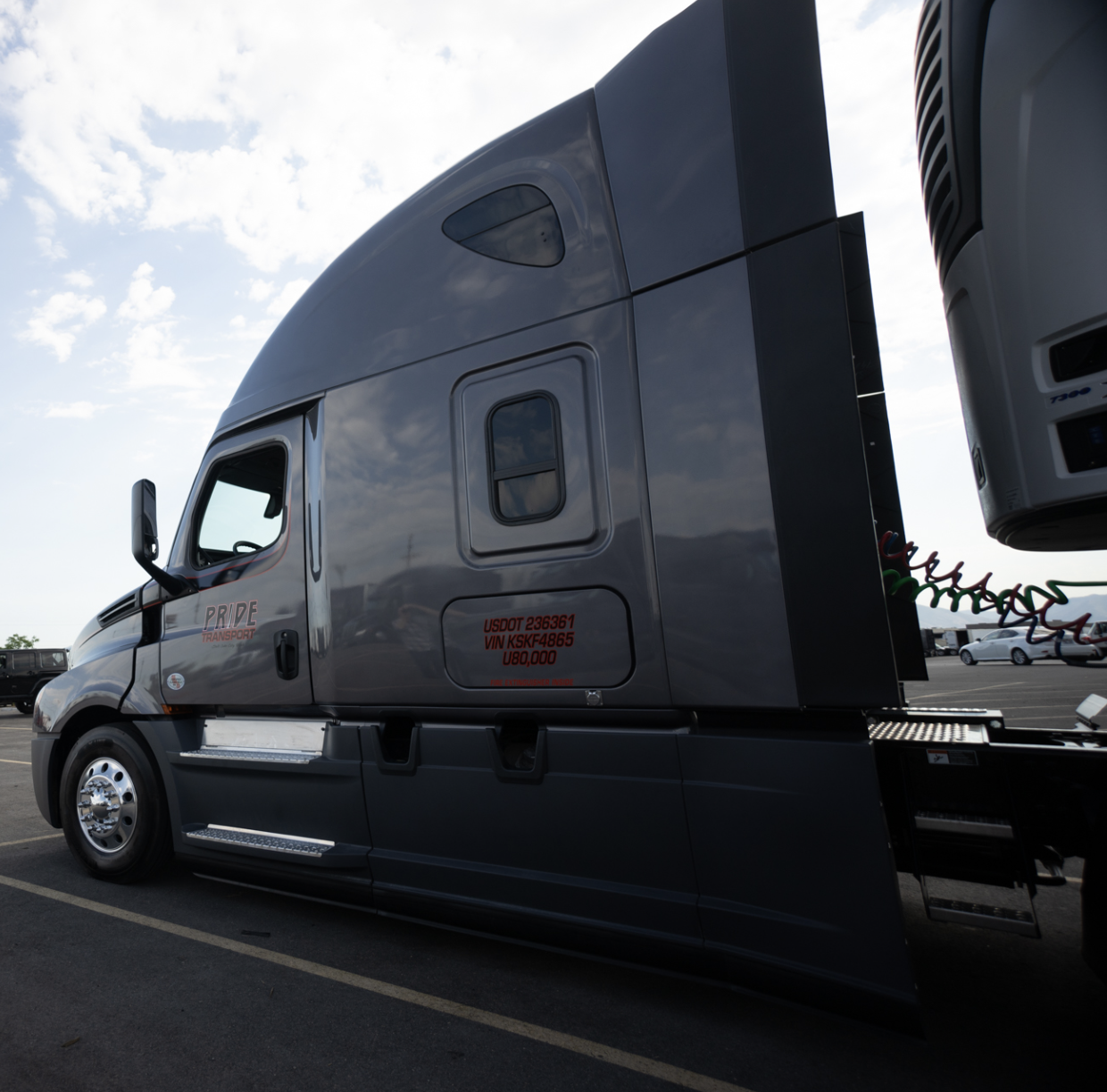 pride transport truck from side angle