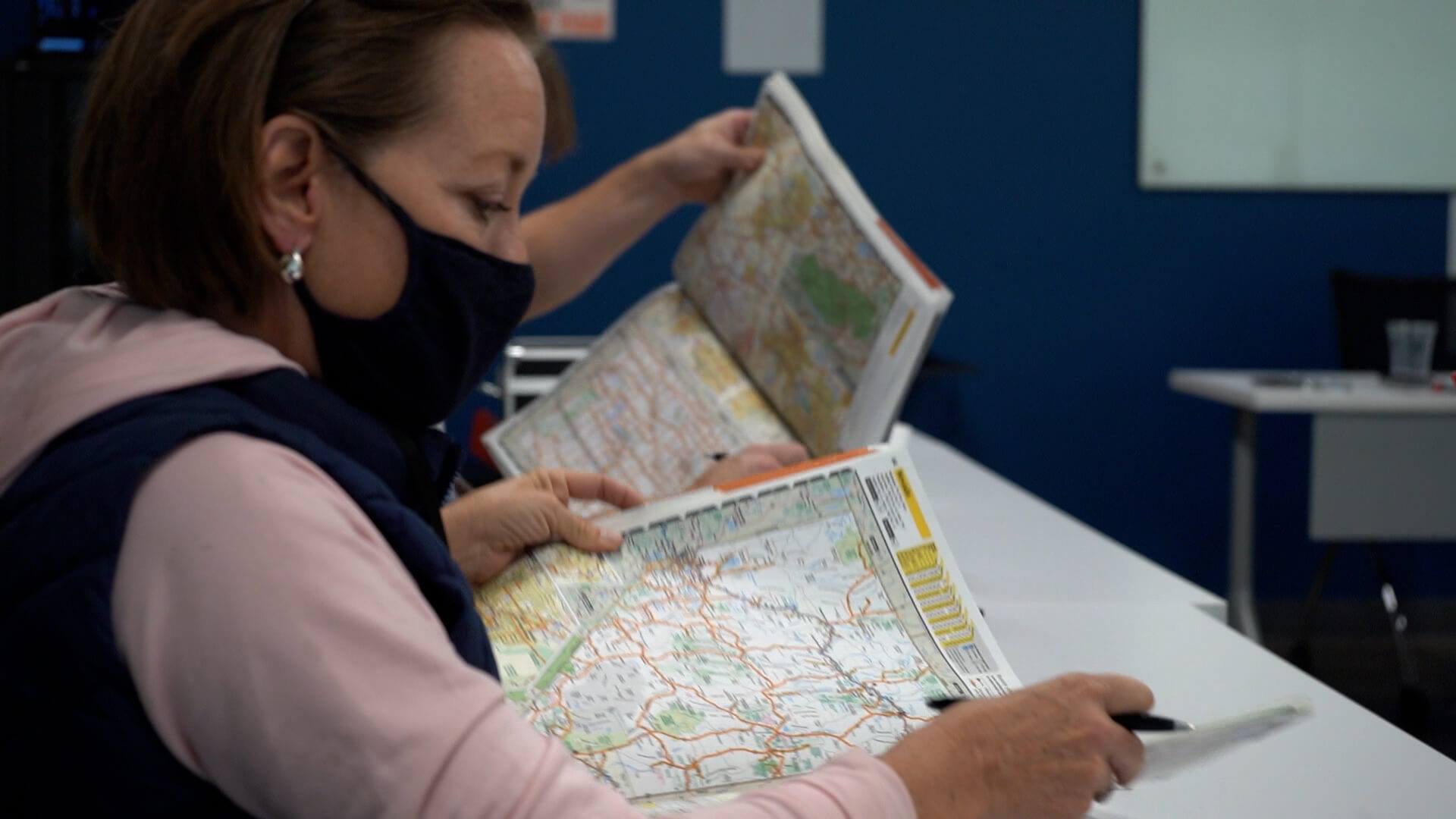 woman looking at map