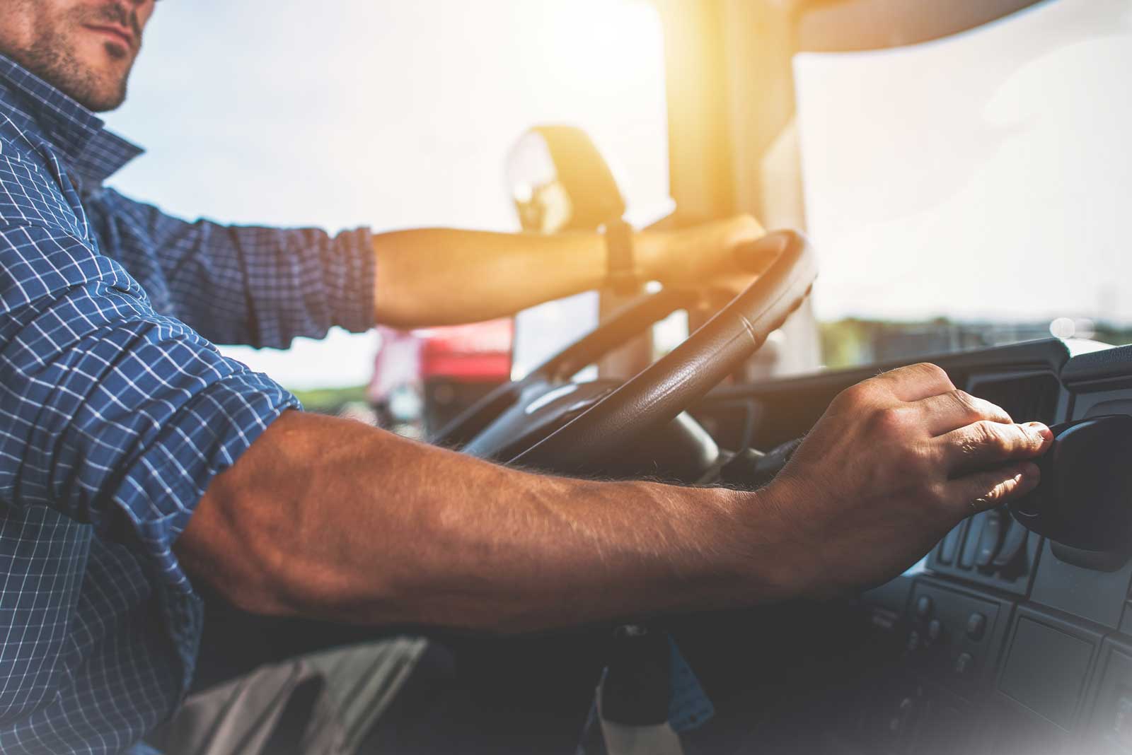 semi truck driver changing gears