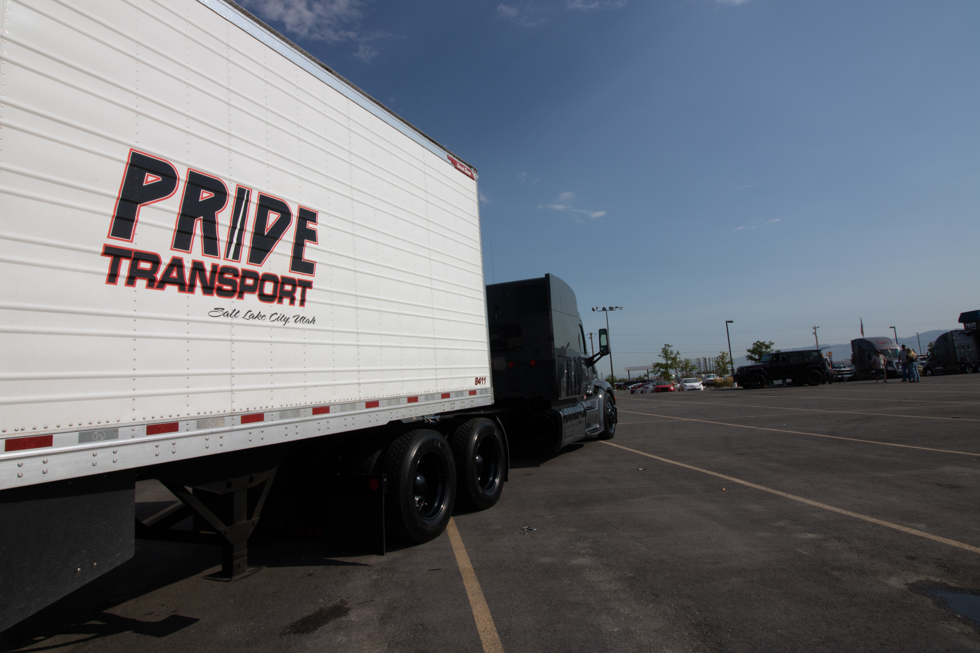 pride transport truck in parking lot