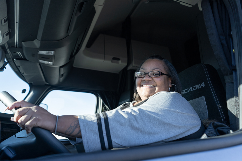 pride transport driver in truck