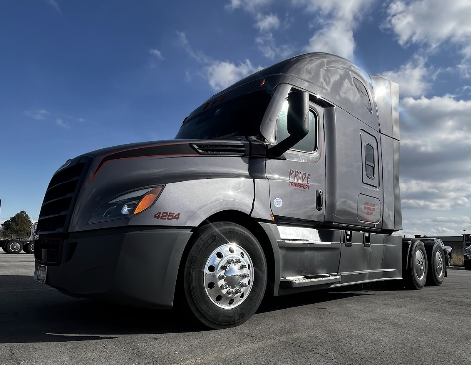 pride transport truck parked in lot